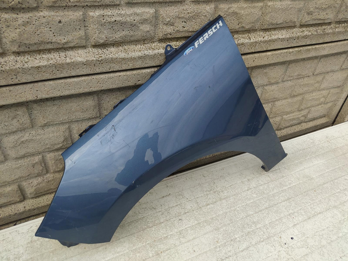 FORD FIESTA Mk8 MK 8 16-22 BŁOTNIK PRZEDNI LEWY - (12614734332)