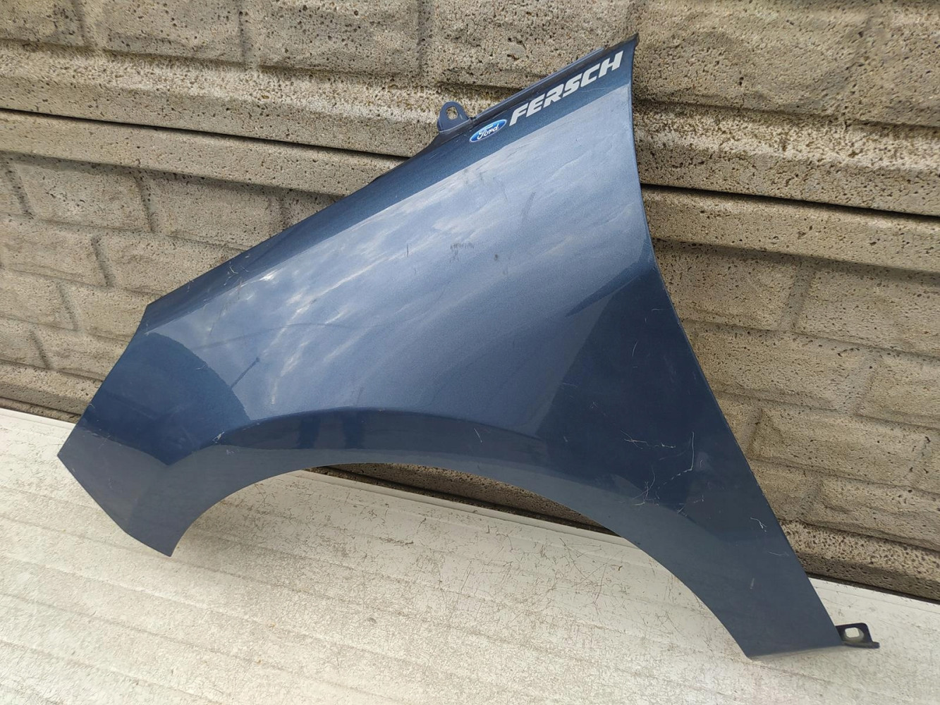 FORD FIESTA Mk8 MK 8 16-22 BŁOTNIK PRZEDNI LEWY - (12614734332)