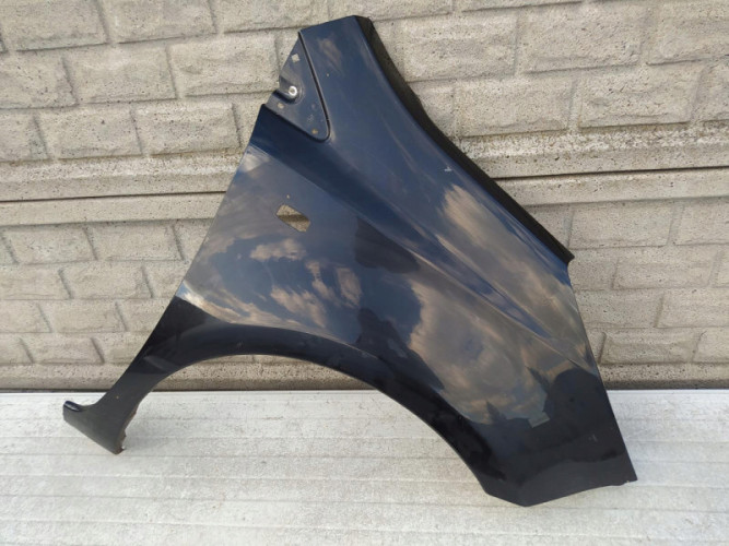 NISSAN NOTE 2006 - 2012 BŁOTNIK PRZEDNI PRAWY - (12638145857)