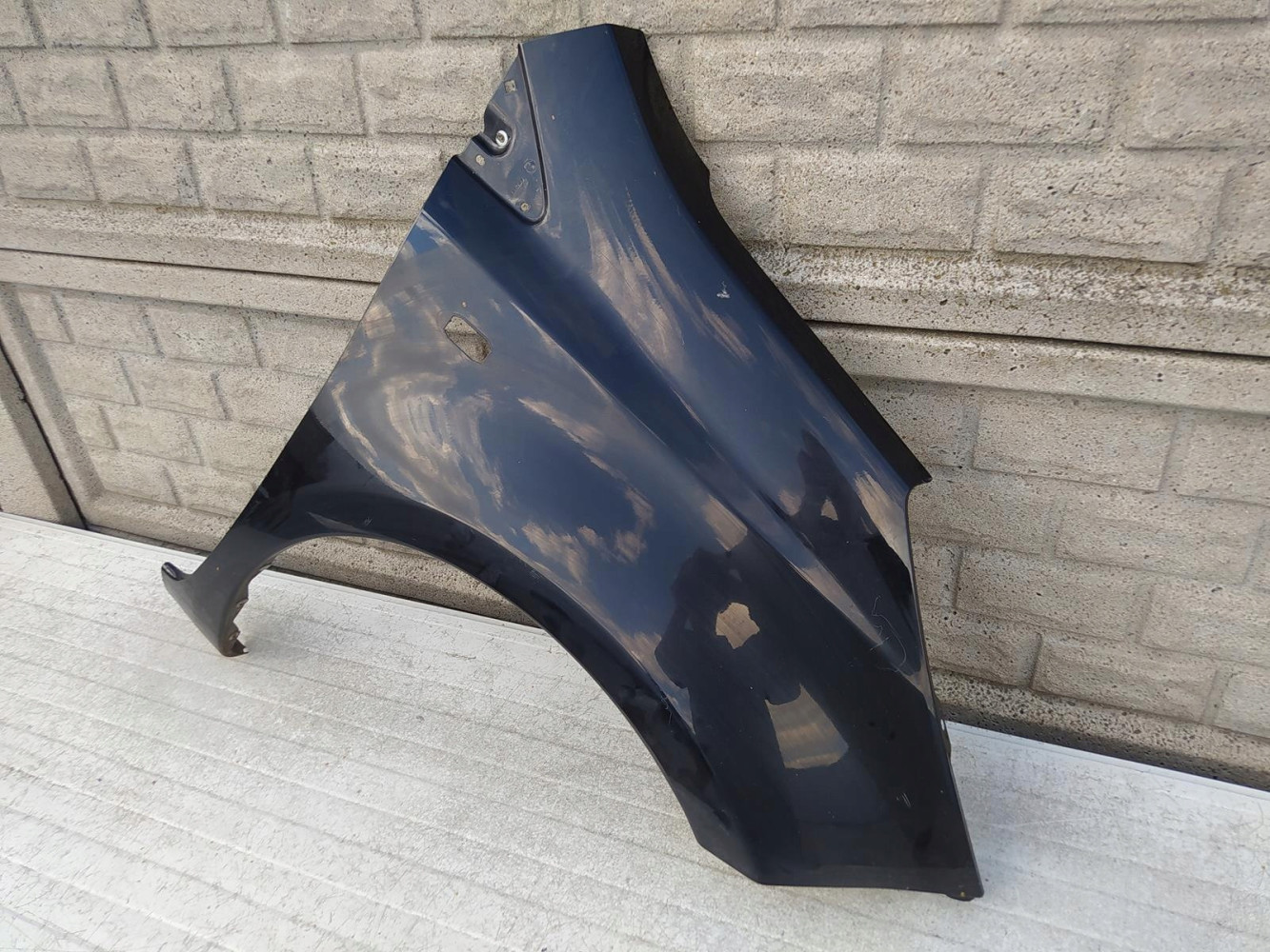 NISSAN NOTE 2006 - 2012 BŁOTNIK PRZEDNI PRAWY - (12638145857)