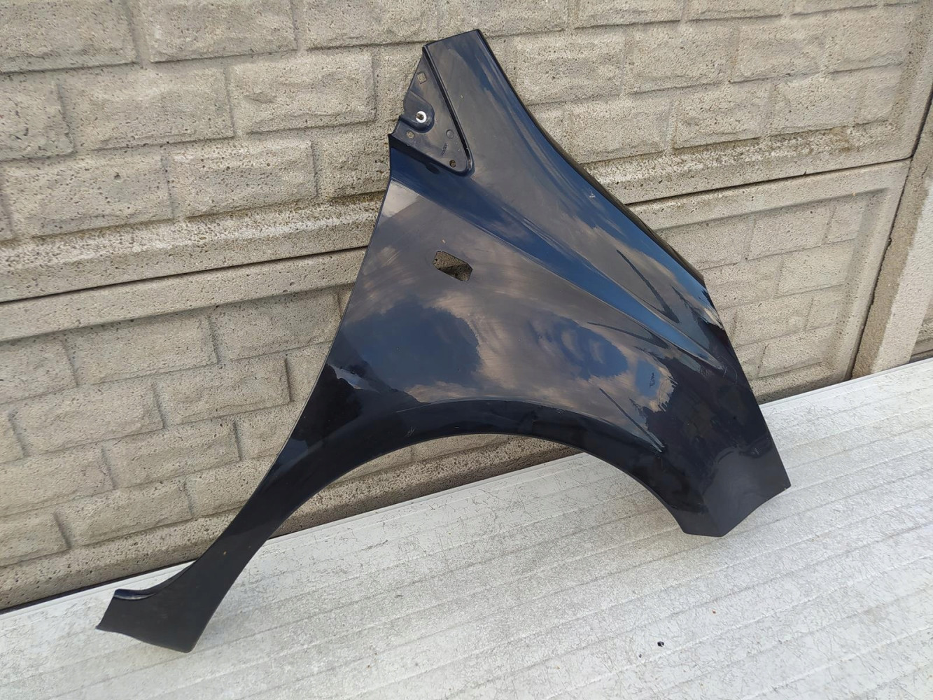 NISSAN NOTE 2006 - 2012 BŁOTNIK PRZEDNI PRAWY - (12638145857)