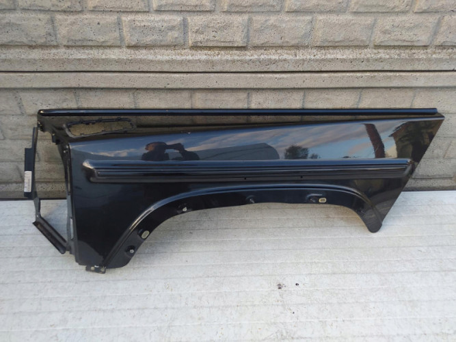 MERCEDES G KLASA W463 W464 BŁOTNIK LEWY PRZEDNI - (12698373874)