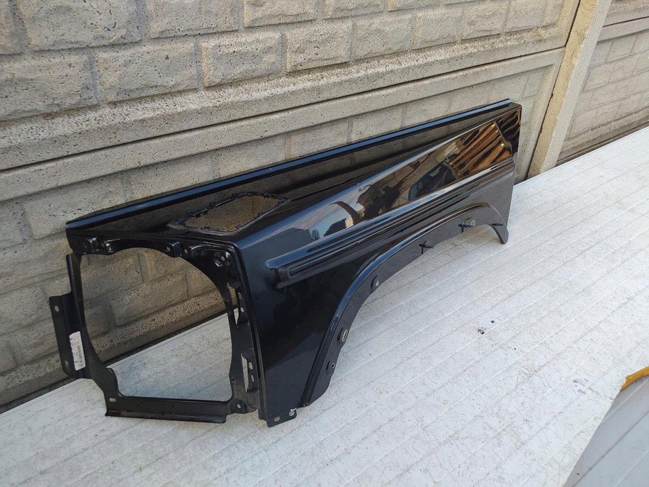 MERCEDES G KLASA W463 W464 BŁOTNIK LEWY PRZEDNI - (12698373874)