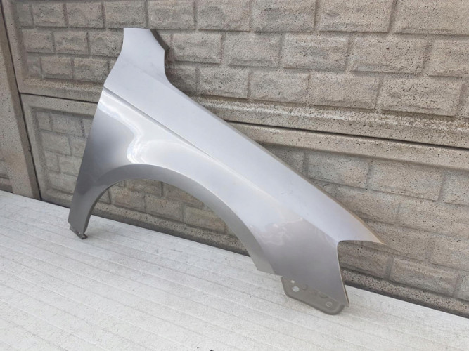 BŁOTNIK PRZEDNI PRAWY VW PASSAT B7 2010 - 2017 - (12766684758)