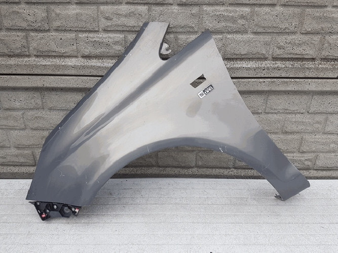 BŁOTNIK LEWY OPEL CORSA D 2006-2015 - (12782039285)