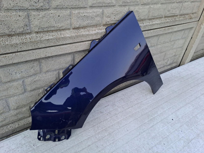 OPEL ADAM BŁOTNIK PRZEDNI LEWY - (12877238613)