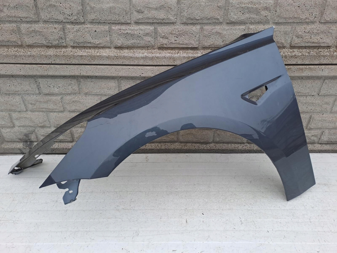 TESLA 3 III 2017-2022 BŁOTNIK PRZEDNI LEWY - (12958263995)