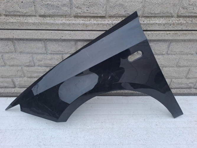 SEAT IBIZA 2009-2017 BŁOTNIK PRZEDNI LEWY - (12990222105)