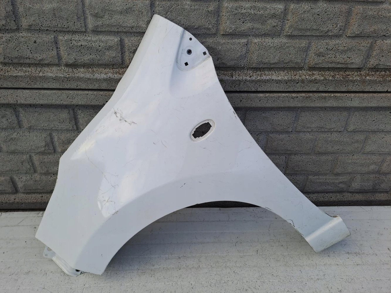 NISSAN PIXO SUZUKI ALTO BŁOTNIK LEWY PRZEDNI - (12997229074)