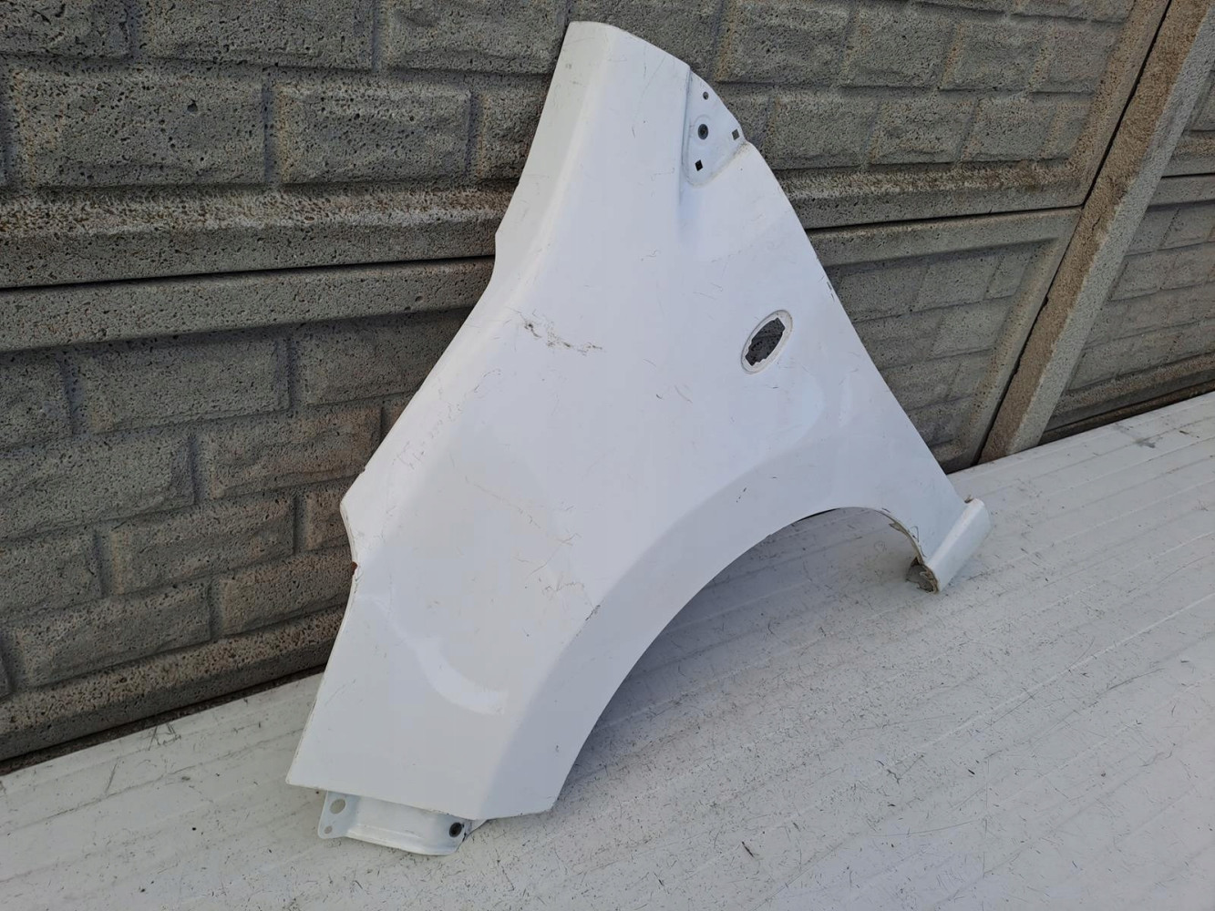 NISSAN PIXO SUZUKI ALTO BŁOTNIK LEWY PRZEDNI - (12997229074)