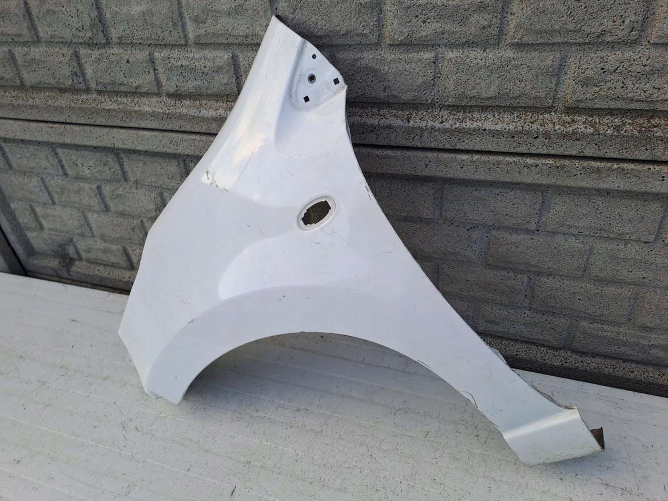 NISSAN PIXO SUZUKI ALTO BŁOTNIK LEWY PRZEDNI - (12997229074)