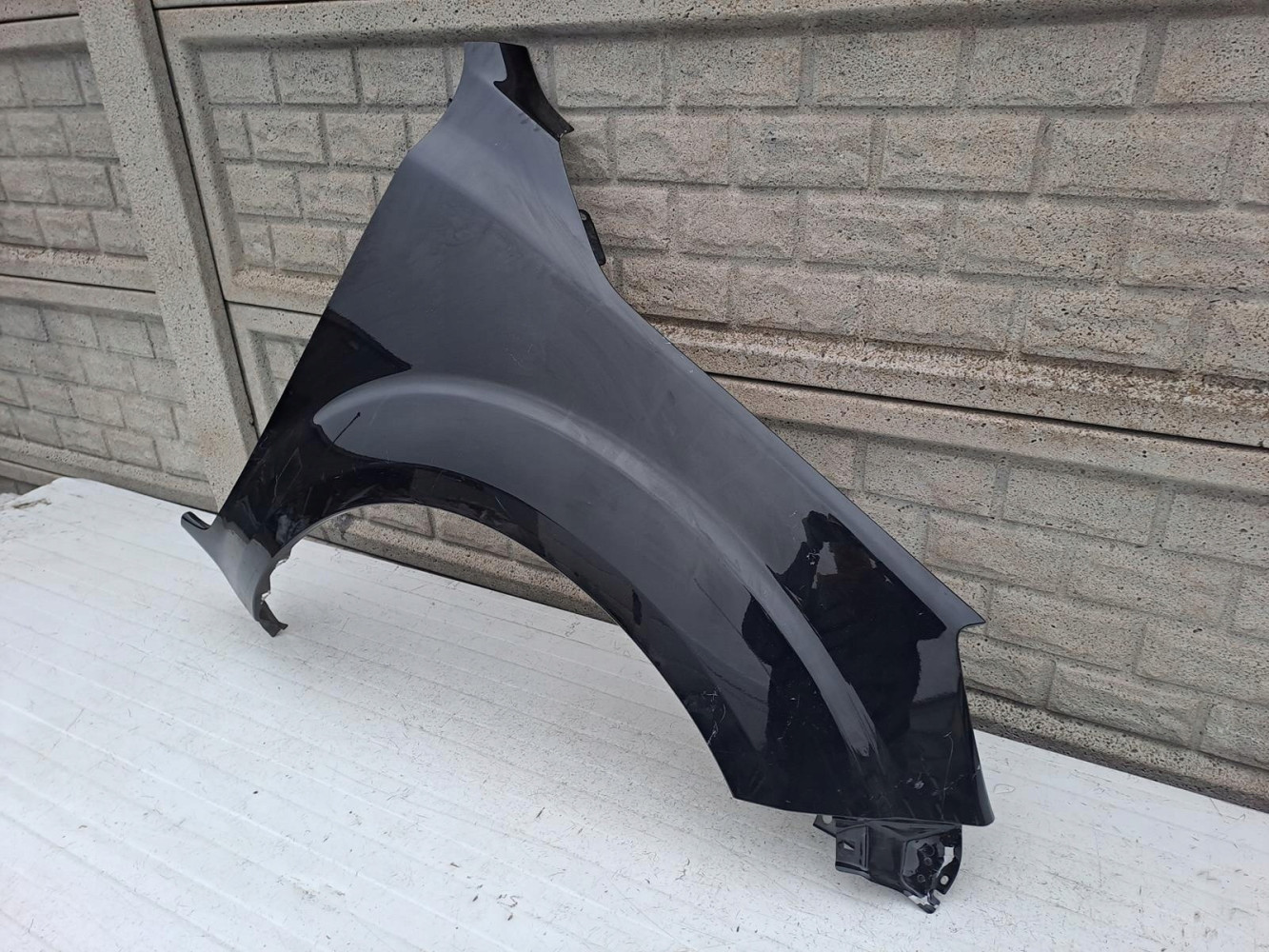 NISSAN NAVARA IV 16-22 BŁOTNIK PRZEDNI PRAWY - (13007194190)