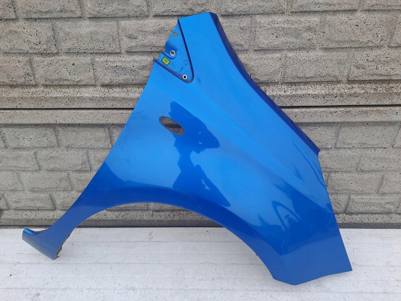 NISSAN NOTE 2006 - 2012 BŁOTNIK PRZEDNI PRAWY - (13042145721)