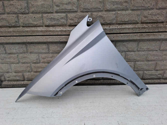 SEAT ARONA BŁOTNIK PRZEDNI LEWY - (13054325569)