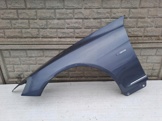 MERCEDES W216 CL 216 LIFT BŁOTNIK PRZEDNI LEWY - (13091077784)