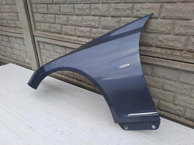 MERCEDES W216 CL 216 LIFT BŁOTNIK PRZEDNI LEWY - (13091077784)