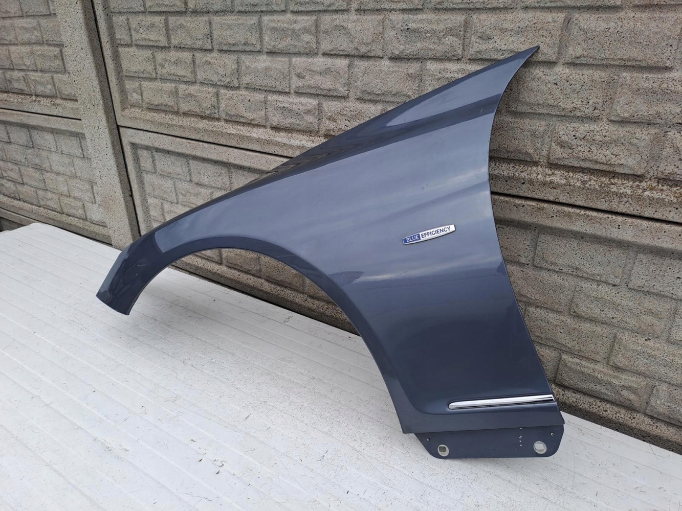 MERCEDES W216 CL 216 LIFT BŁOTNIK PRZEDNI LEWY - (13091077784)