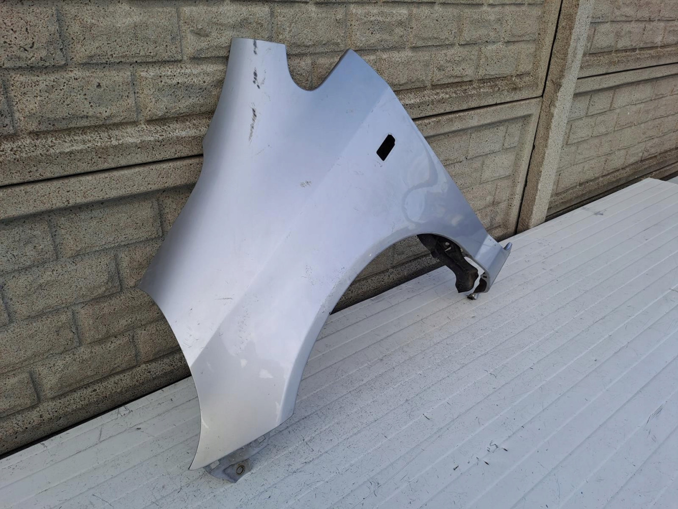 HONDA JAZZ II 2 BŁOTNIK PRZEDNI LEWY - (13091389878)