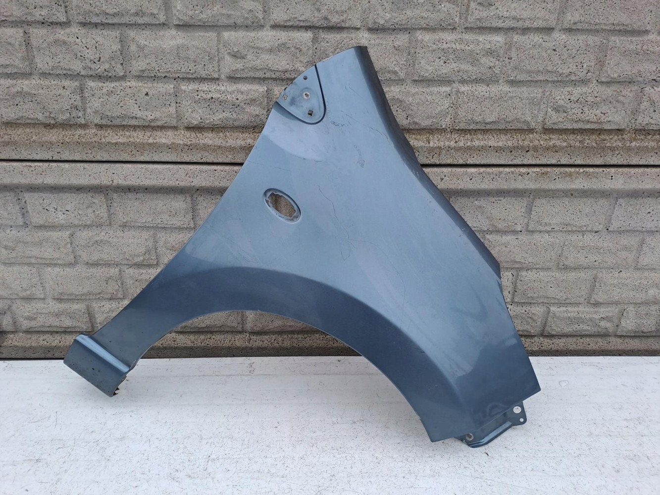 NISSAN PIXO SUZUKI ALTO BŁOTNIK PRAWY PRZEDNI - (13135247166)