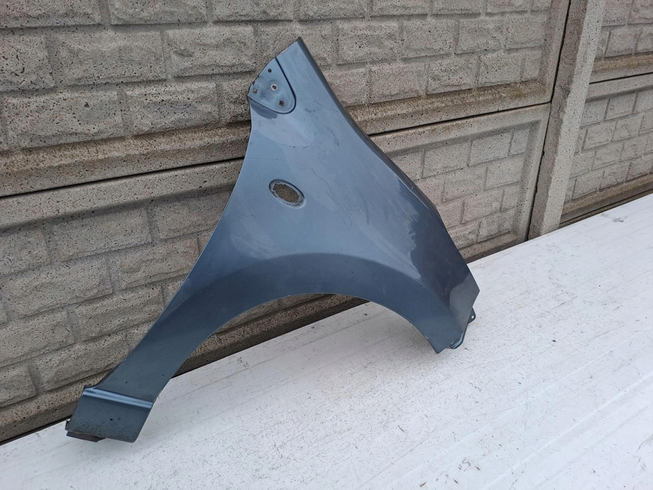 NISSAN PIXO SUZUKI ALTO BŁOTNIK PRAWY PRZEDNI - (13135247166)