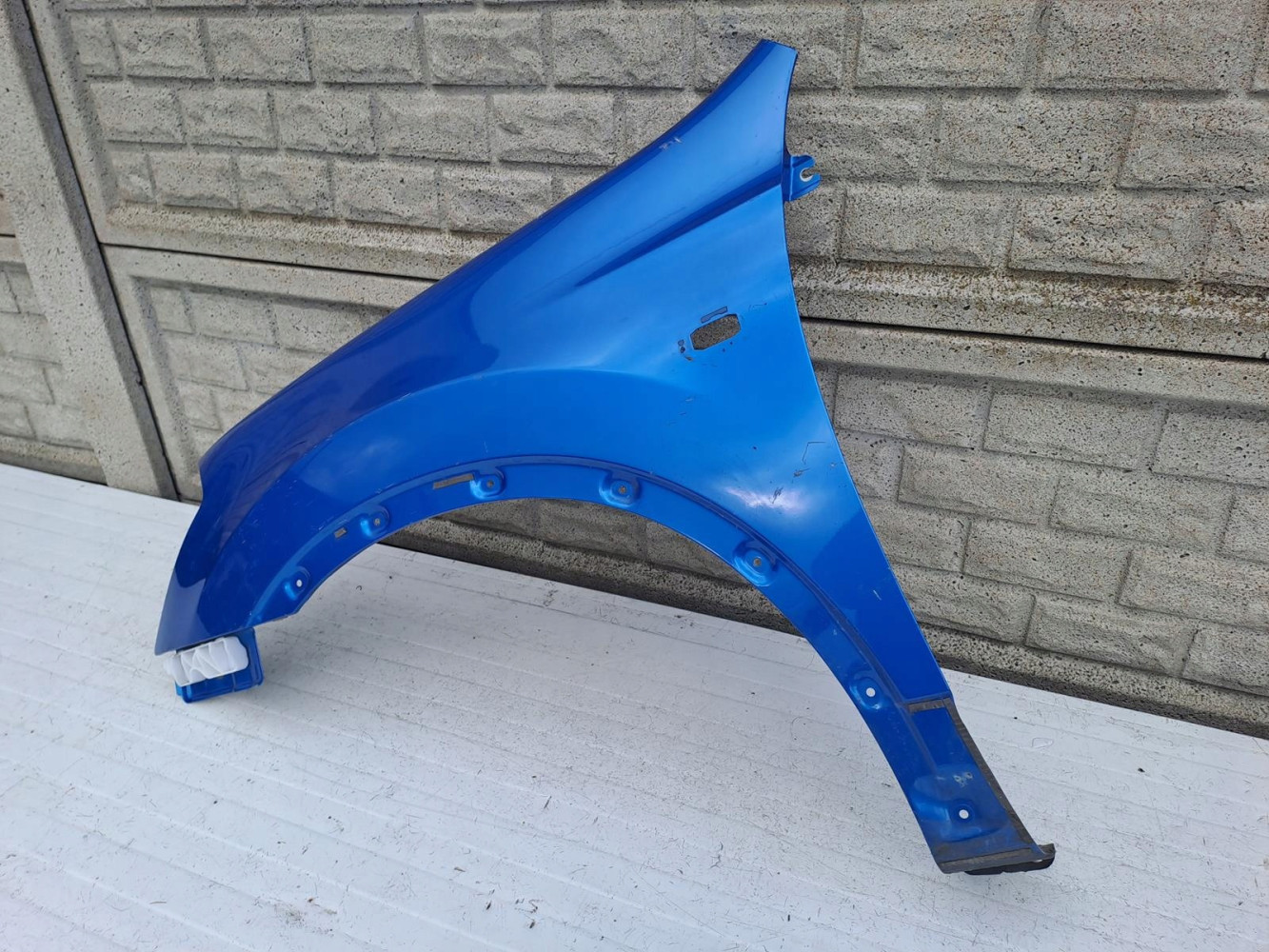 NISSAN QASHQAI 06-09 BŁOTNIK PRZEDNI LEWY - (13218214360)
